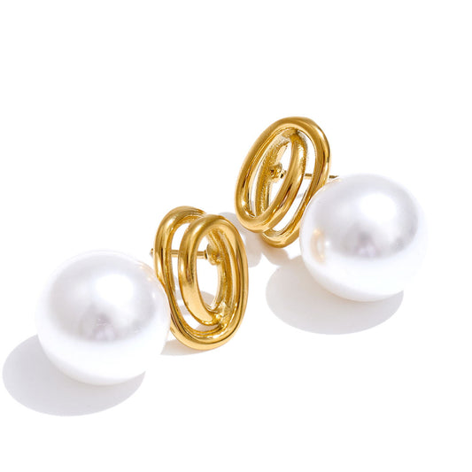 The Lyra Spiral Pearl Studs