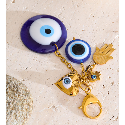 Evil Eye Charm Bag Pendant – Gold & Blue Protective Charm