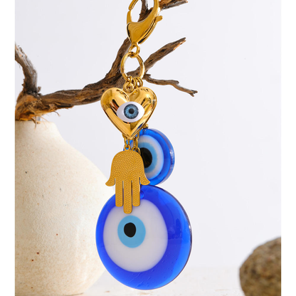 Evil Eye Charm Bag Pendant – Gold & Blue Protective Charm