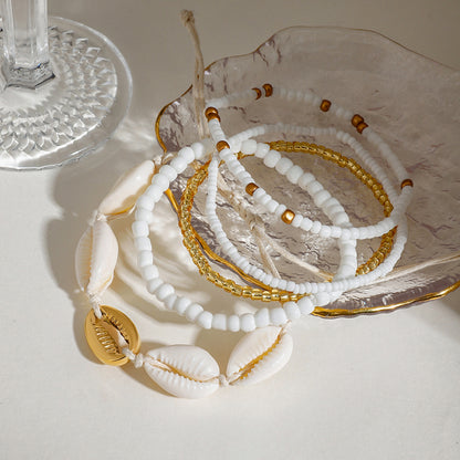 Tidal Cowrie Starfish Layered Anklet Set