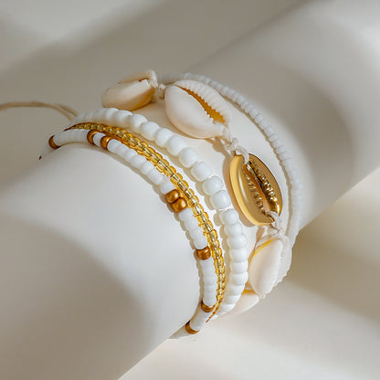 Tidal Cowrie Starfish Layered Anklet Set