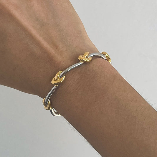 Two‑Tone Knot Cuff Bracelet