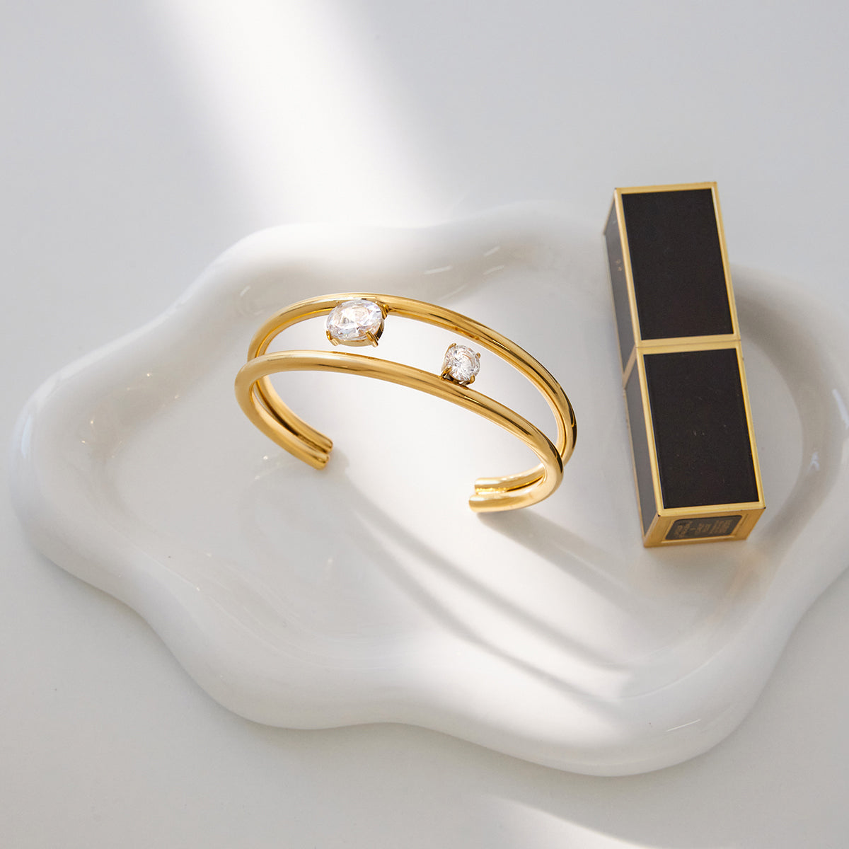 he Lyra Floating Crystal Bangle