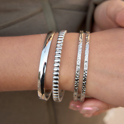 The Silver Sculpted Ribbon Bangle