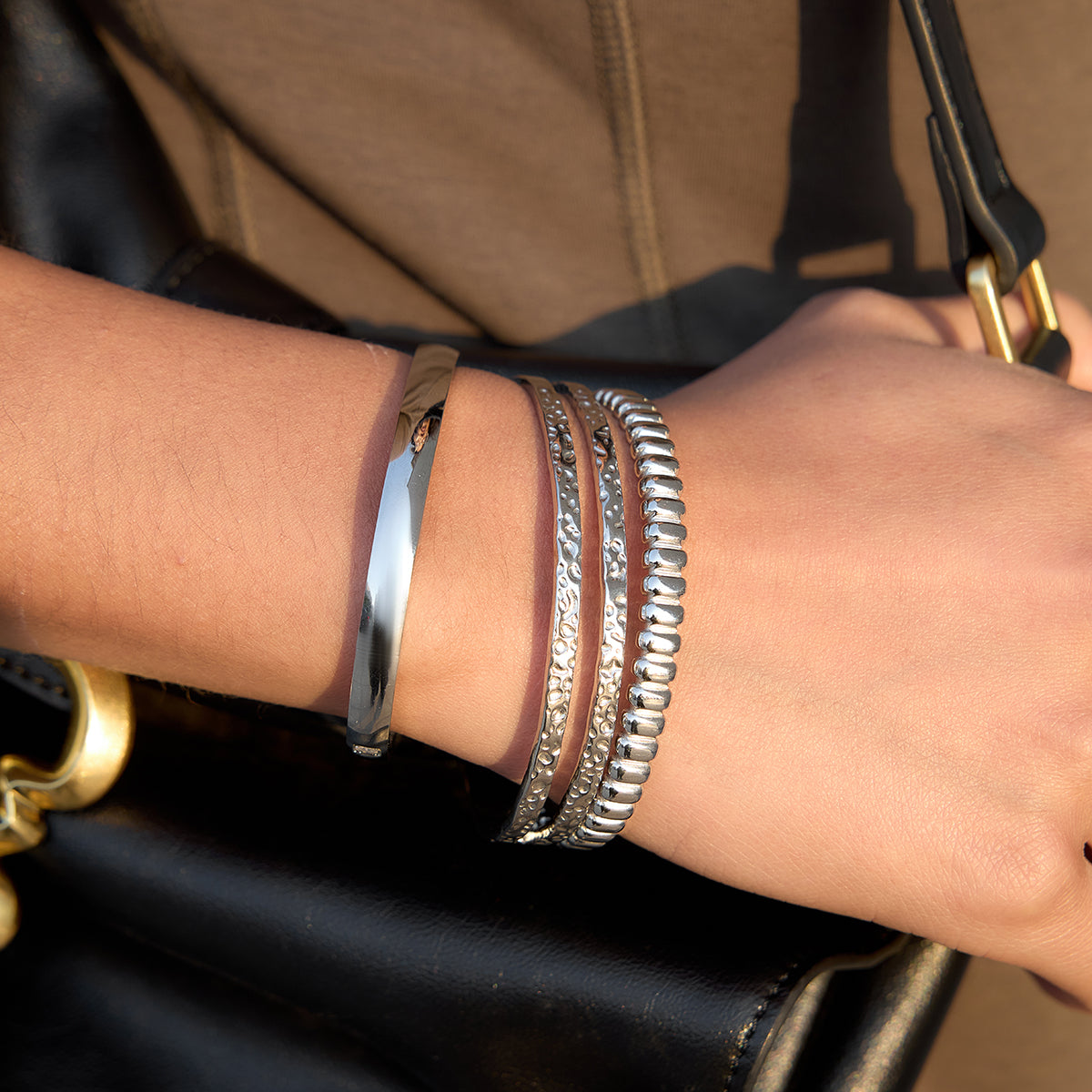The Silver Sculpted Ribbon Bangle
