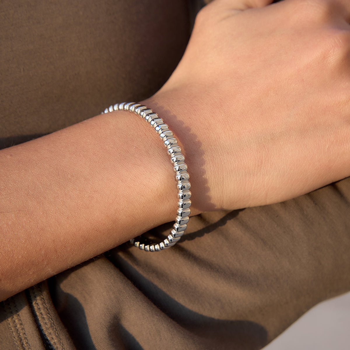 The Silver Sculpted Ribbon Bangle