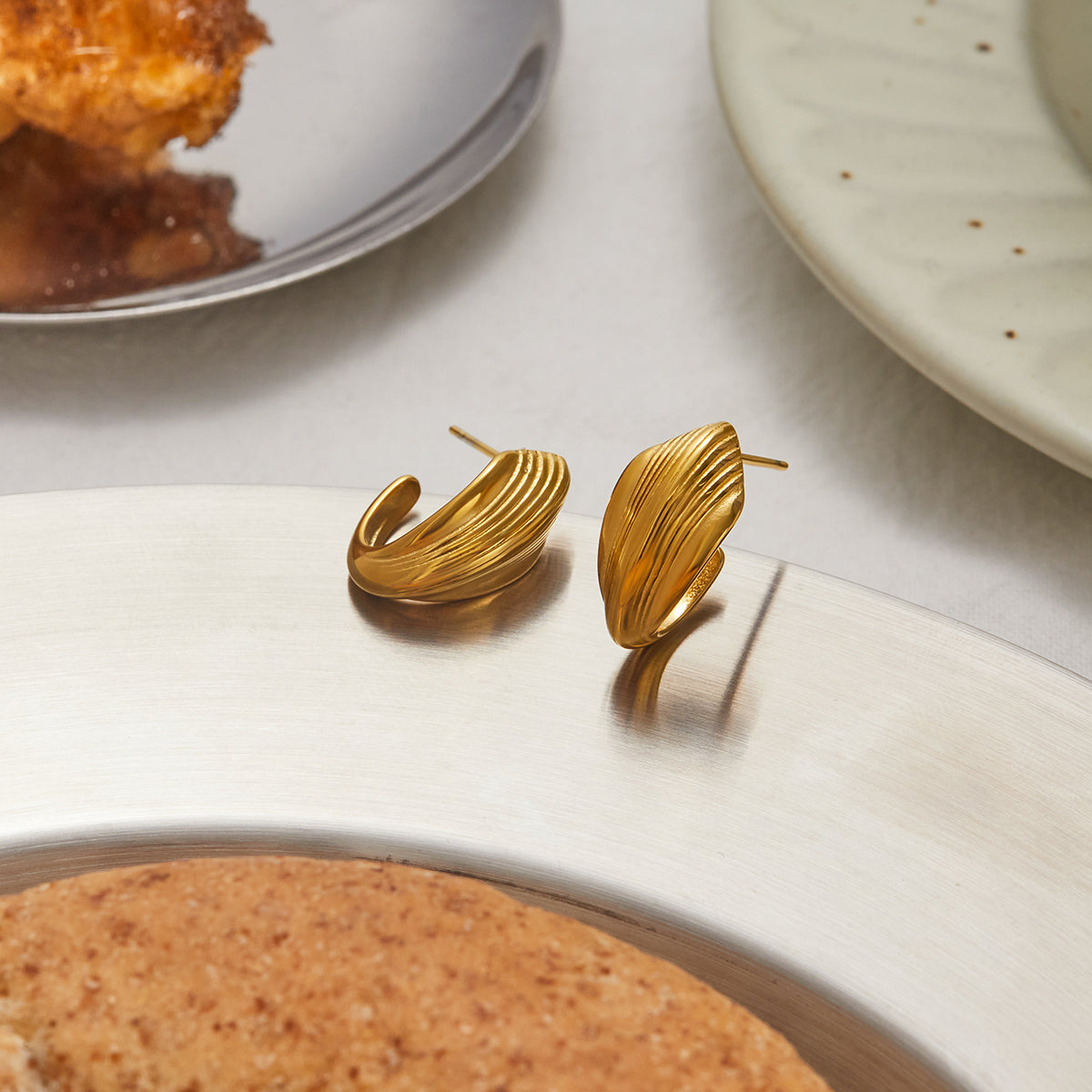 Gold Ripple Huggie Earrings