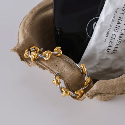 Two‑Tone Knot Hoop Earrings