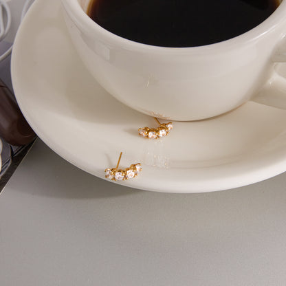 The Lumina Sunburst Studs