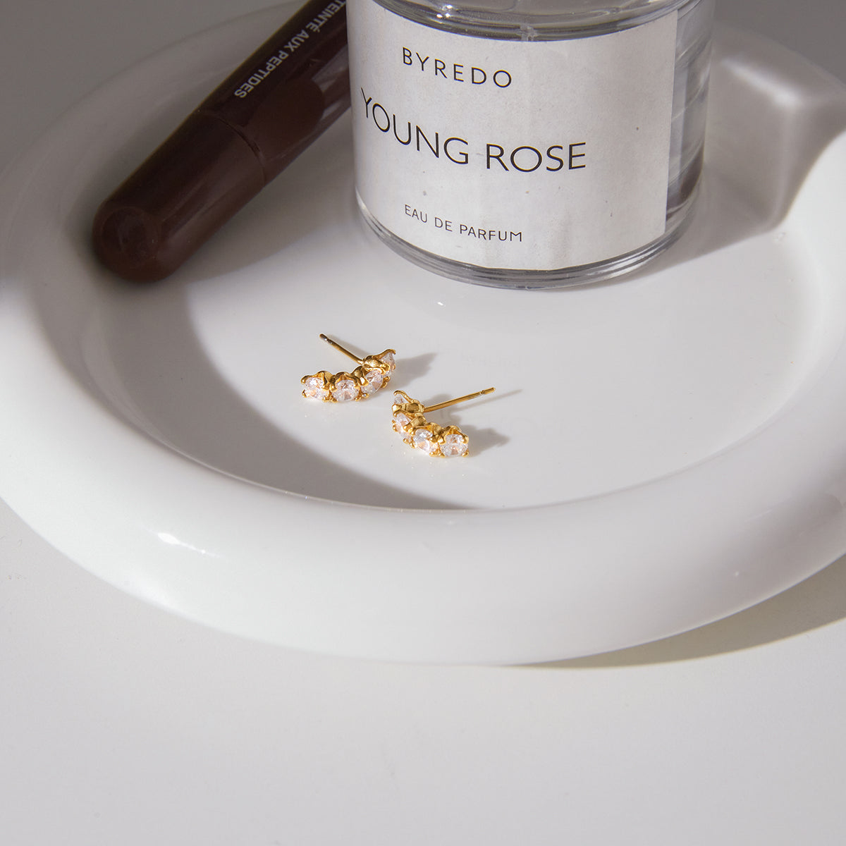 The Lumina Sunburst Studs