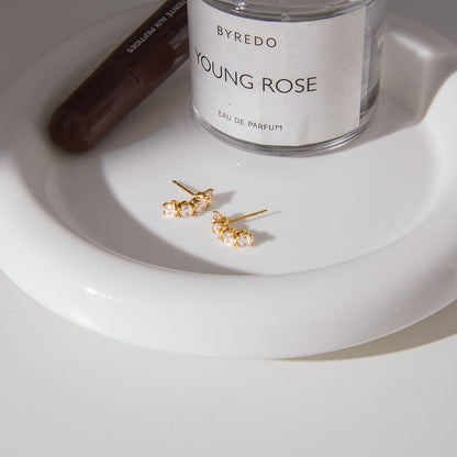 The Lumina Sunburst Studs