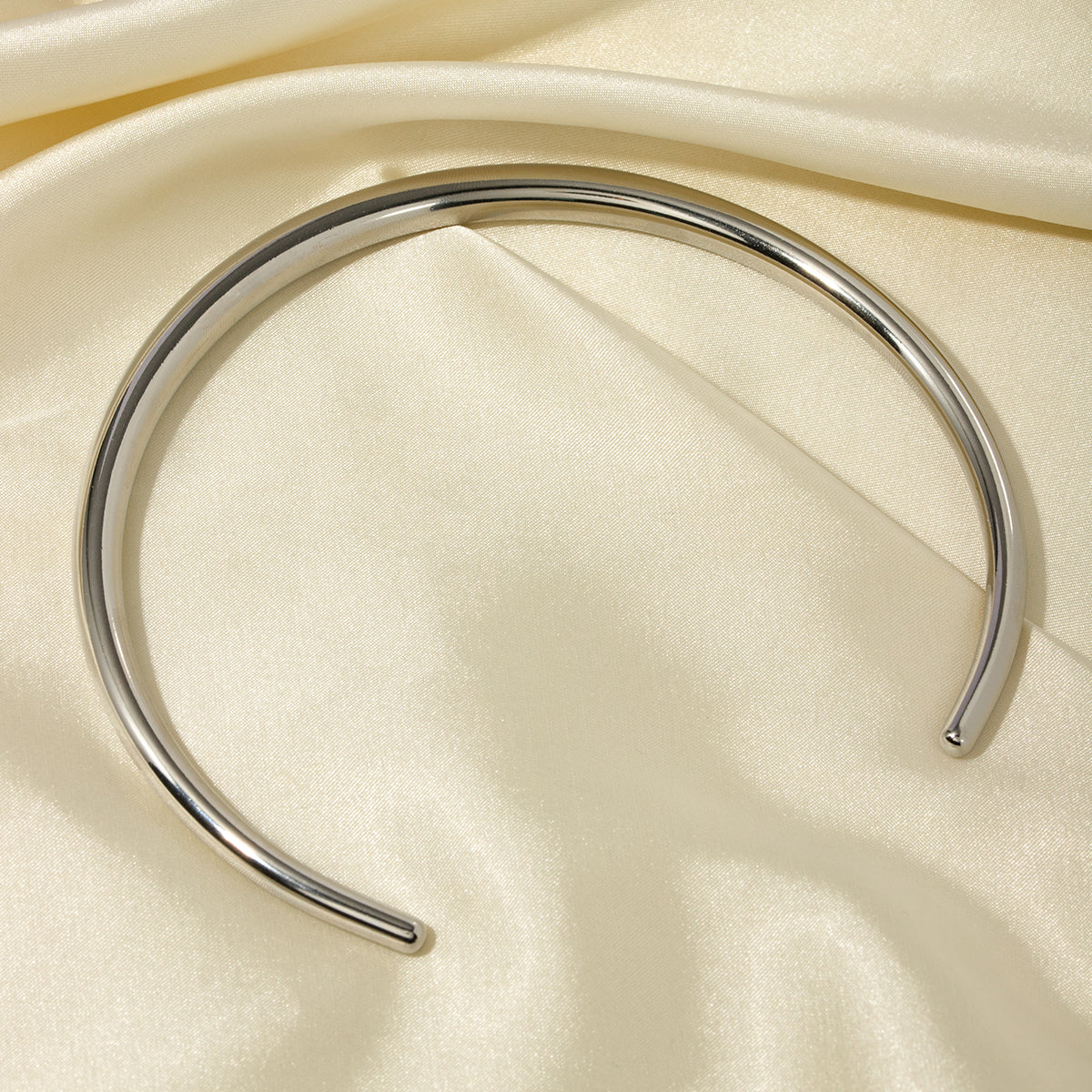 Sleek Silver Torque Necklace