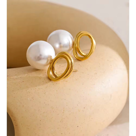 The Lyra Spiral Pearl Studs