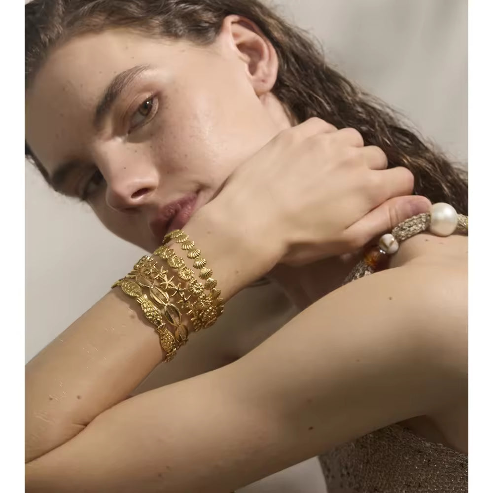Golden Solis Cowrie Cuff