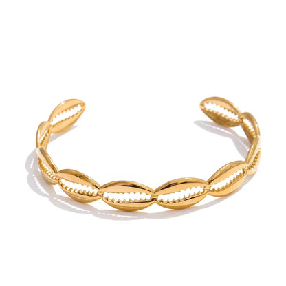 Golden Solis Cowrie Cuff